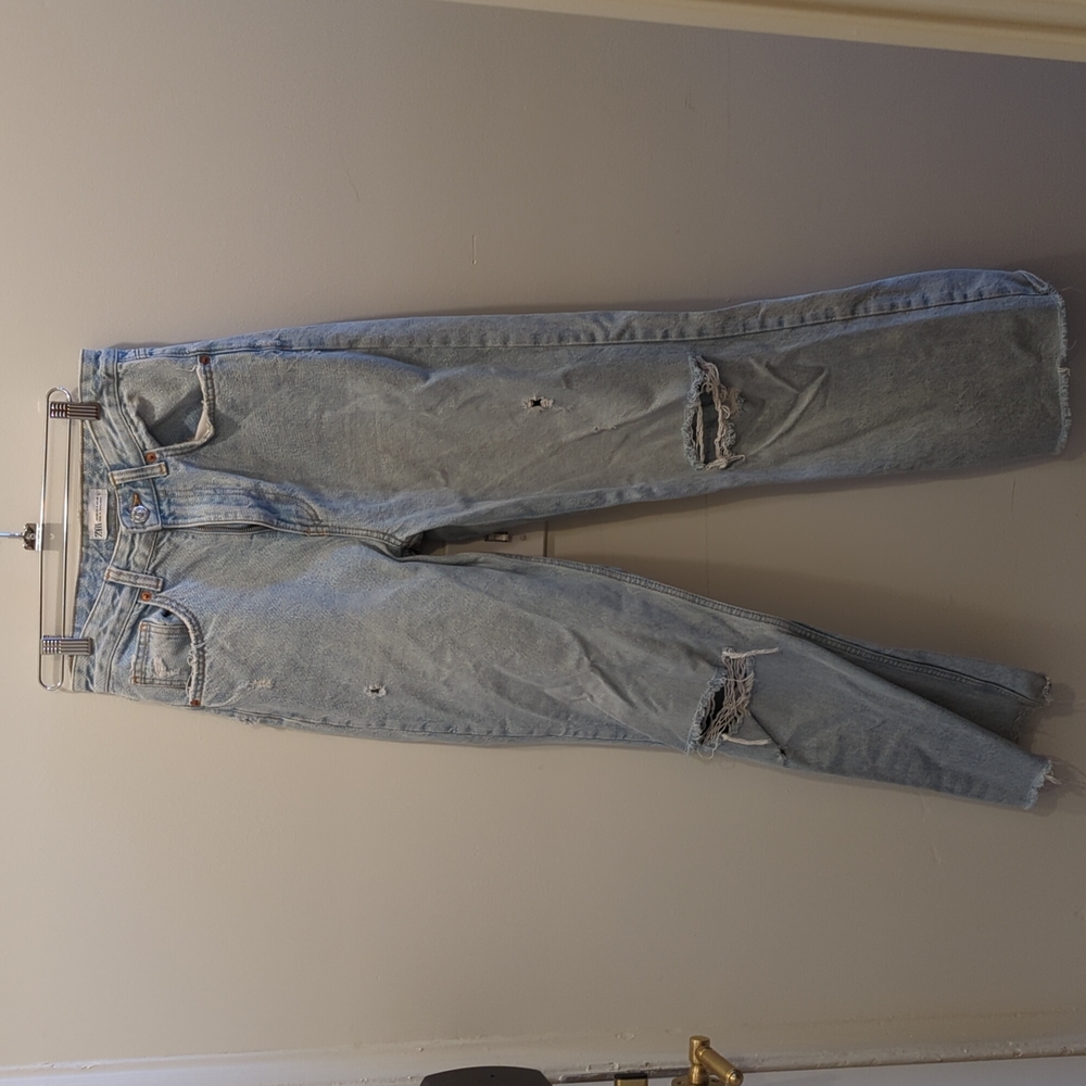 Jeans with holes.